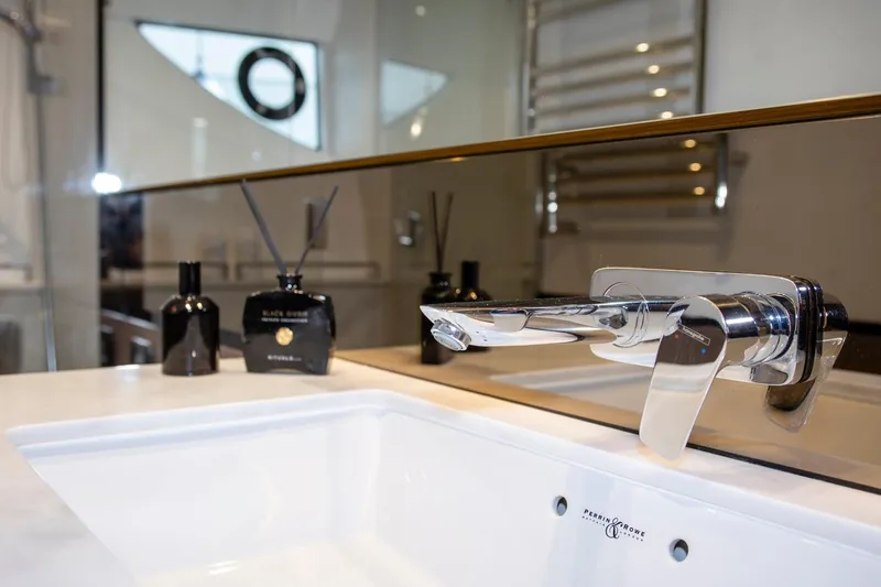  Yacht Photos Pics Modern bathroom sink with chrome faucet on Princess S66 yacht, 2022 model.