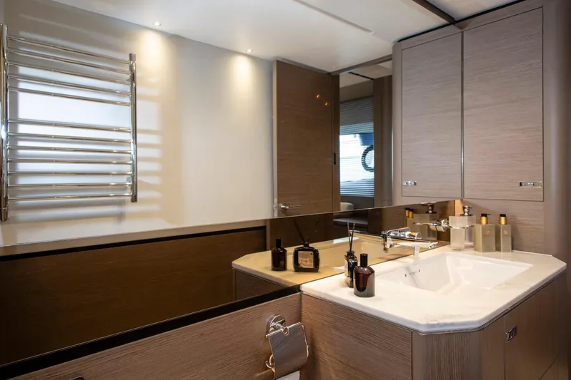  Yacht Photos Pics Luxurious bathroom interior on 2022 Princess S66 yacht, featuring modern fixtures and elegant design.