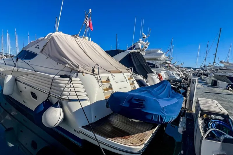  Yacht Photos Pics Luxury yacht Cantieri di Sarnico 45, 2001 model, docked in a marina.