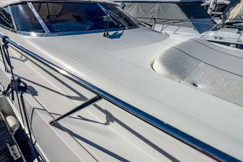  Yacht Photos Pics Luxury Cantieri di Sarnico 45 yacht, 2001 model, with sleek white exterior and polished chrome details.