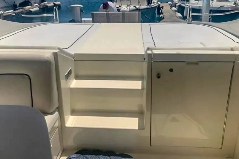  Yacht Photos Pics Interior view of 2001 Cantieri di Sarnico 45 yacht with steps and storage.