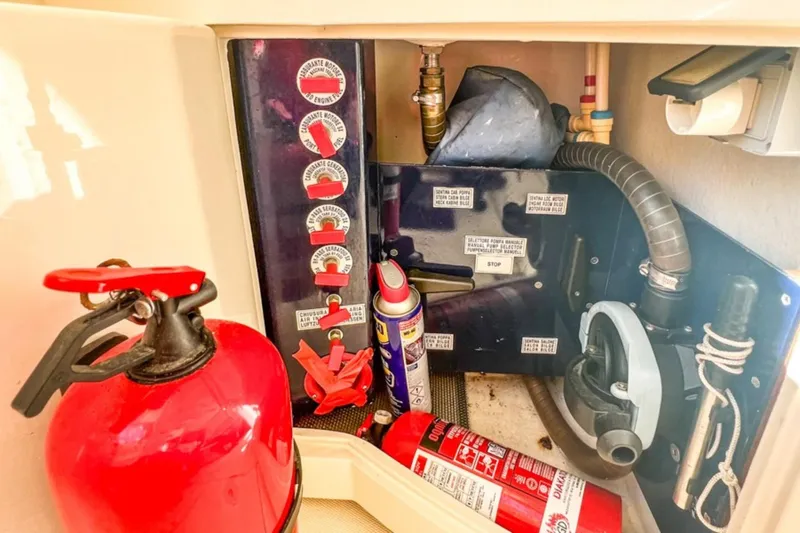  Yacht Photos Pics Fire safety equipment and controls inside a 2001 Cantieri di Sarnico 45 boat.