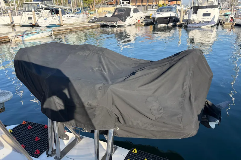  Yacht Photos Pics Covered Sea Ray 400 Sundancer boat at marina, 1998 model, with surrounding docked boats.