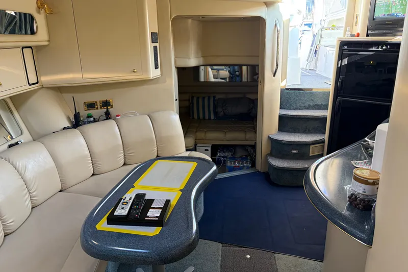  Yacht Photos Pics Interior of 1998 Sea Ray 400 Sundancer yacht with beige seating and modern amenities.