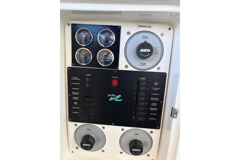  Yacht Photos Pics Control panel of a 1998 Sea Ray 400 Sundancer boat with gauges and switches.