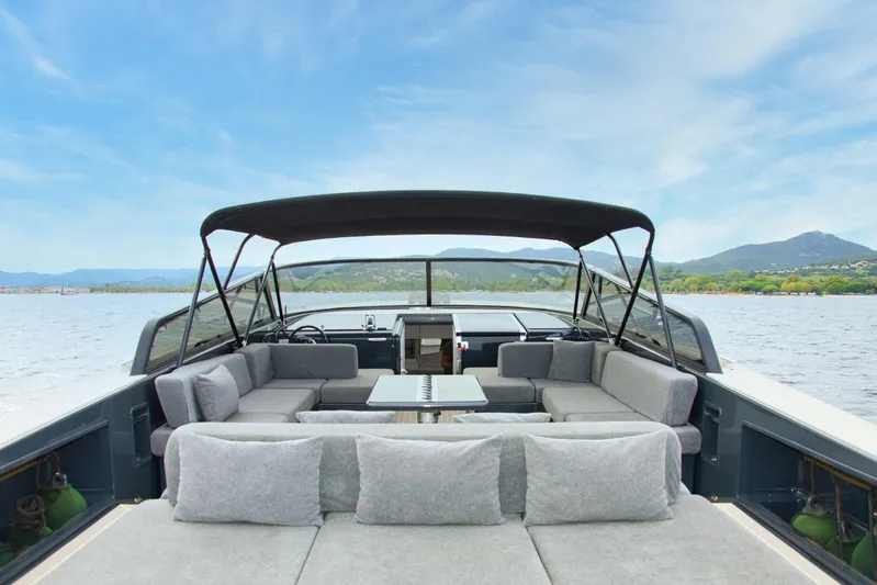 G3 Yacht Photos Pics Luxurious 2013 VanDutch 55 yacht with spacious seating and scenic water view.