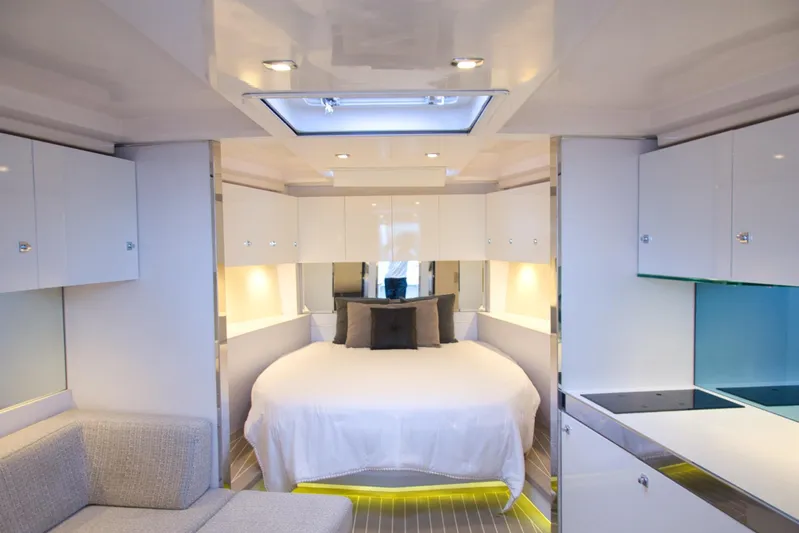 G3 Yacht Photos Pics Luxurious interior of 2013 VanDutch 55 yacht with modern design and cozy bedroom.