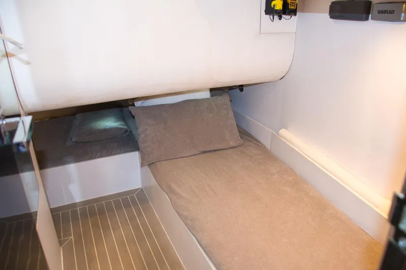 G3 Yacht Photos Pics Interior cabin of 2013 VanDutch 55 yacht with cozy bedding and modern design.