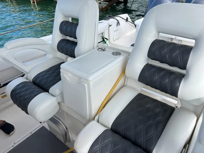  Yacht Photos Pics Luxurious seating on 2014 Everglades 350LX boat with quilted upholstery.