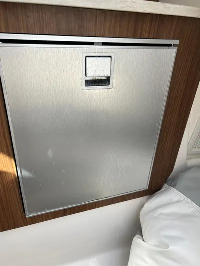  Yacht Photos Pics Stainless steel refrigerator in 2014 Everglades 350LX boat interior.