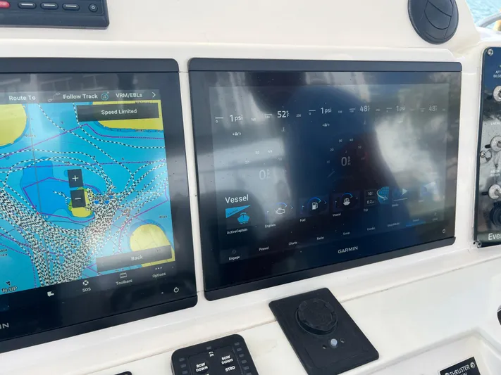  Yacht Photos Pics Navigation screens on a 2014 Everglades 350LX boat dashboard.