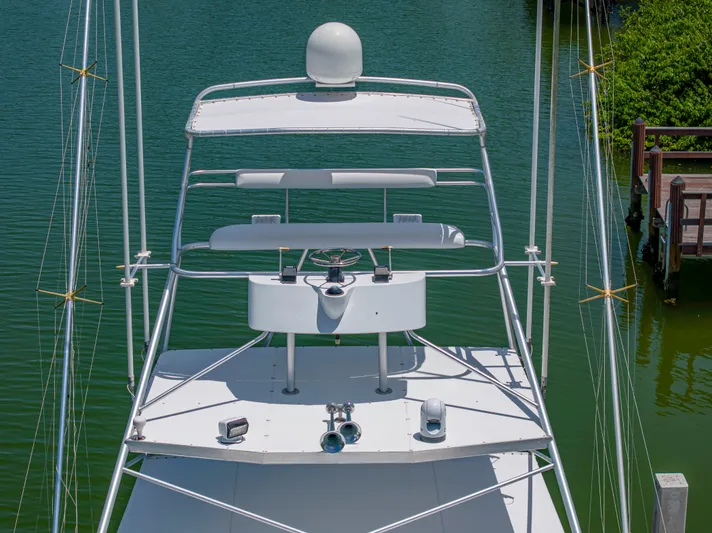 Vintage 1990 Yacht Photos Pics 1990 Buddy Davis 61 Convertible boat tower with radar and antennas.