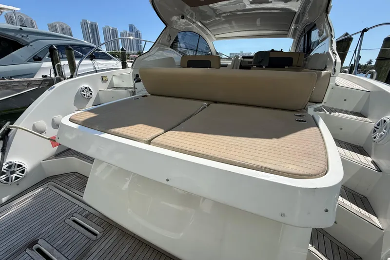  Yacht Photos Pics 2016 Azimut Atlantis 43 yacht with spacious deck and seating area, docked in a marina.