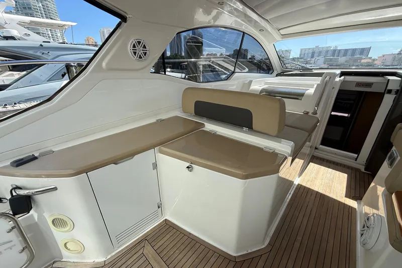  Yacht Photos Pics Interior of 2016 Azimut Atlantis 43 yacht with sleek seating and wooden flooring.