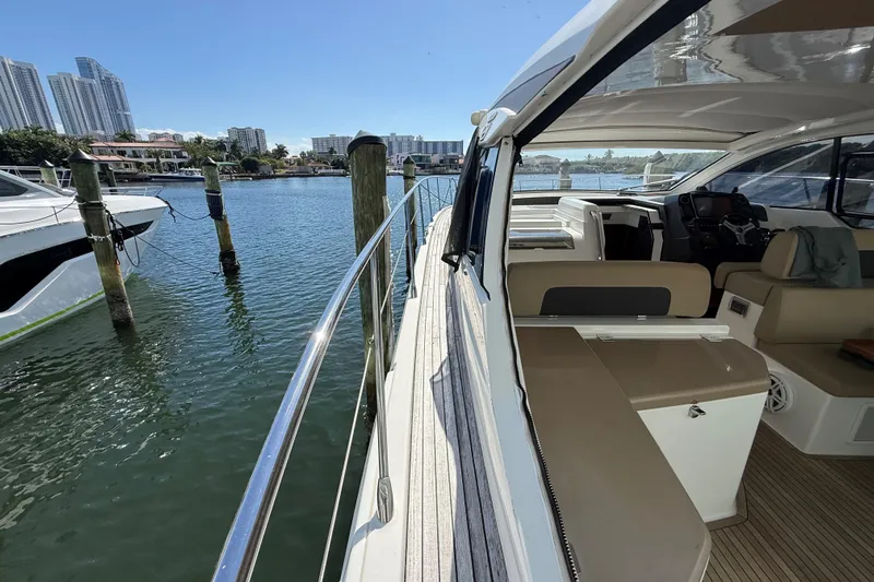  Yacht Photos Pics 2016 Azimut Atlantis 43 yacht docked, showcasing sleek design and luxurious interior.