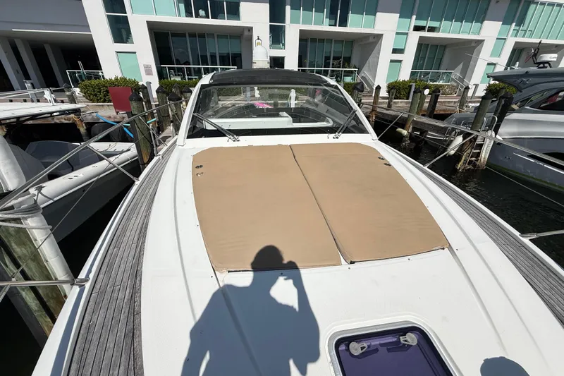  Yacht Photos Pics 2016 Azimut Atlantis 43 yacht docked, featuring sunbathing area and modern design.