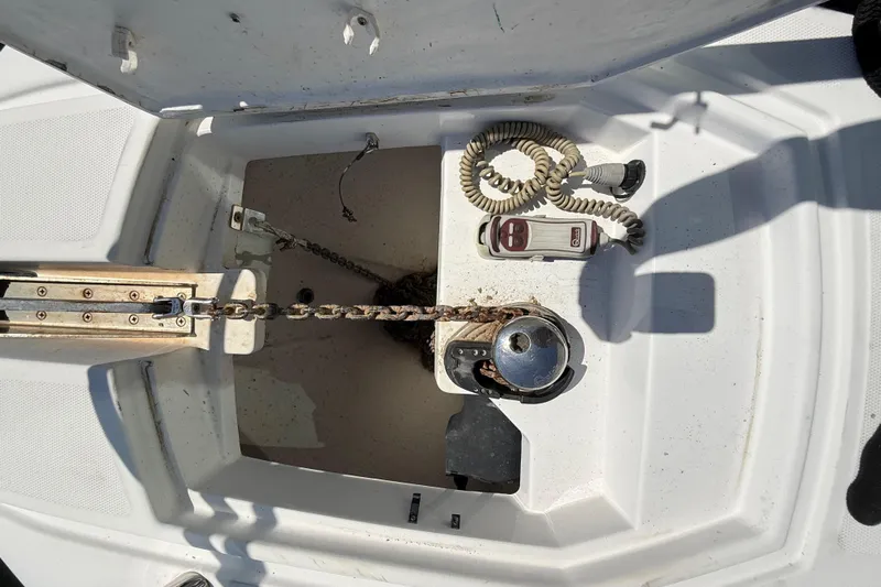 Yacht Photos Pics Anchor compartment of 2016 Azimut Atlantis 43 yacht with chain and control panel.