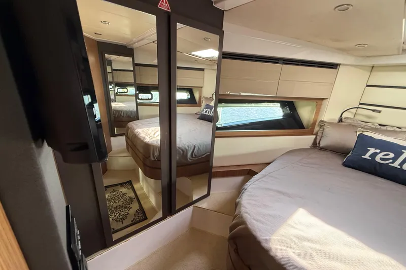  Yacht Photos Pics Luxurious interior of 2016 Azimut Atlantis 43 yacht with cozy bedroom and modern design.