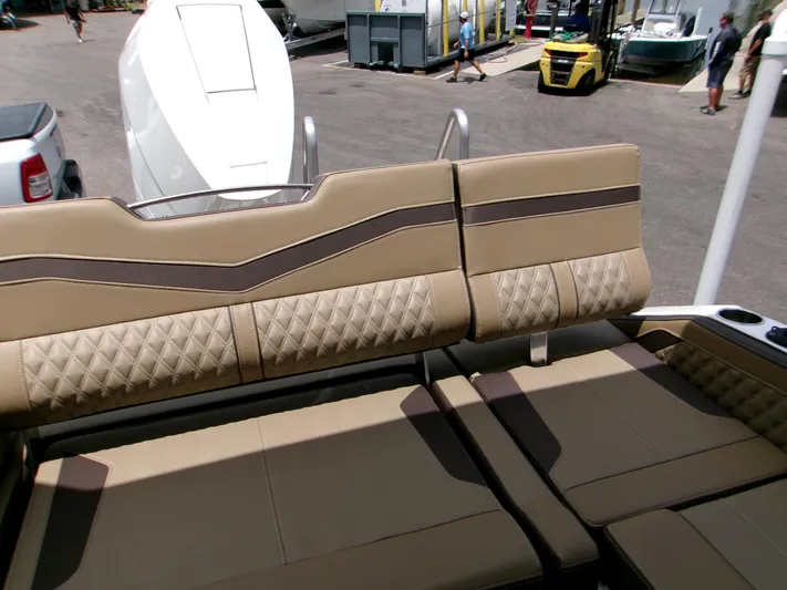  Yacht Photos Pics 2026 Monterey Elite 27 OB boat with luxurious tan seating and diamond stitching.
