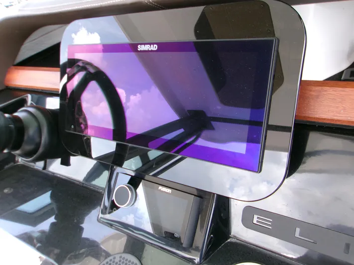  Yacht Photos Pics Simrad display on 2026 Monterey Elite 27 OB boat dashboard.
