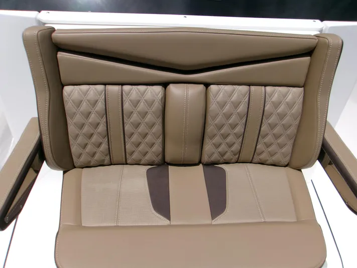  Yacht Photos Pics Luxurious seating on 2026 Monterey Elite 27 OB boat, featuring diamond-stitched upholstery.