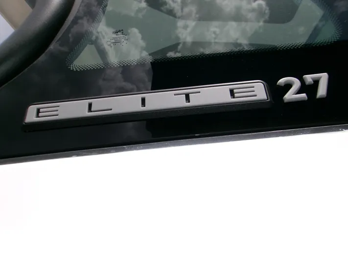  Yacht Photos Pics 2026 Monterey Elite 27 OB logo on sleek black surface.