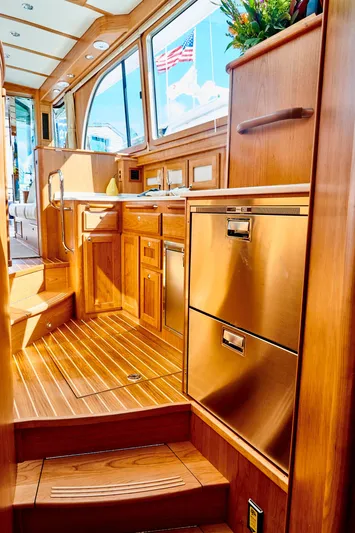 On Order, Ready For Customization Yacht Photos Pics Interior of 2027 Sabre 45 Salon Express with wooden finish.