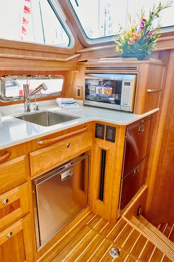On Order, Ready For Customization Yacht Photos Pics Interior of 2027 Sabre 45 Salon Express with modern kitchen.