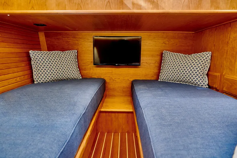 On Order, Ready For Customization Yacht Photos Pics Interior of Sabre 45 Salon Express 2027 with twin beds and TV.