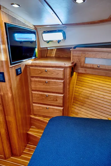 On Order, Ready For Customization Yacht Photos Pics Interior of 2027 Sabre 45 Salon Express with wooden furnishings.