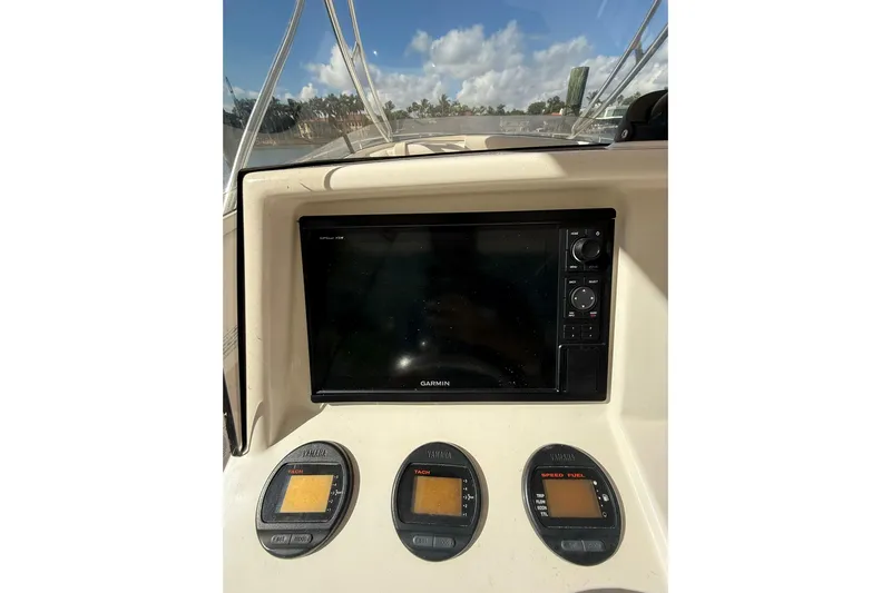  Yacht Photos Pics Dashboard of 2008 Intrepid 370 Cuddy with Garmin display and Yamaha gauges.