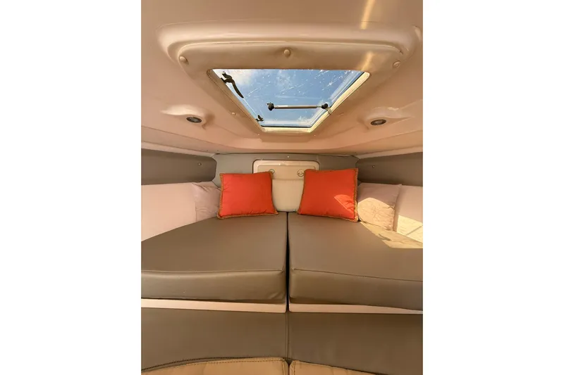  Yacht Photos Pics 2008 Intrepid 370 Cuddy cabin interior with skylight and cushions.