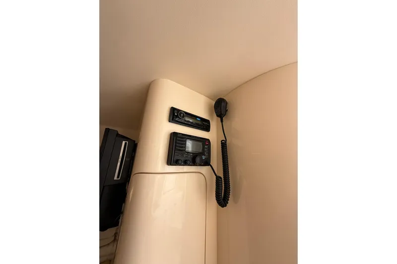  Yacht Photos Pics Interior electronics of 2008 Intrepid 370 Cuddy boat, featuring communication devices.