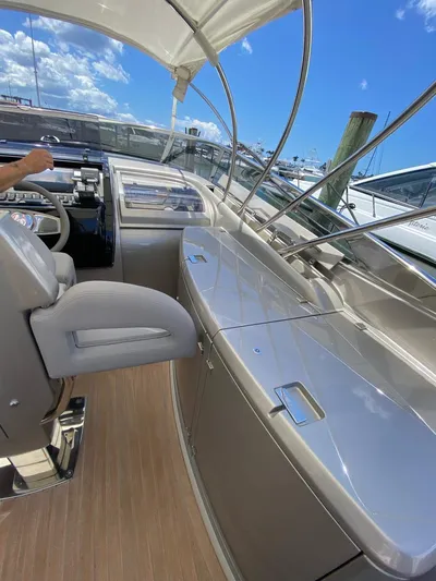  Yacht Photos Pics 2006 Riva RAMA 44' yacht interior with sleek design and modern controls.