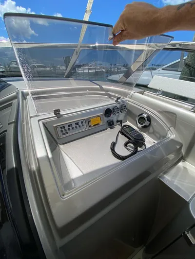  Yacht Photos Pics Control panel of a 2006 Riva RAMA 44' yacht with gauges and radio.