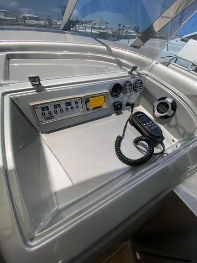  Yacht Photos Pics Control panel of a 2006 Riva RAMA 44' yacht with gauges and radio.