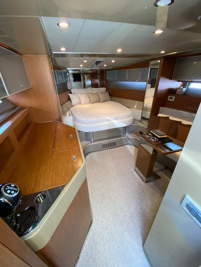  Yacht Photos Pics Luxurious interior of 2006 Riva RAMA 44' yacht with modern amenities and elegant design.