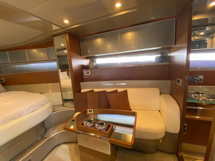  Yacht Photos Pics Luxurious interior of 2006 Riva RAMA 44' yacht with cozy seating and modern design.