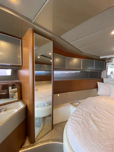  Yacht Photos Pics Interior of 2006 Riva RAMA 44' yacht with modern wood and metallic finishes.