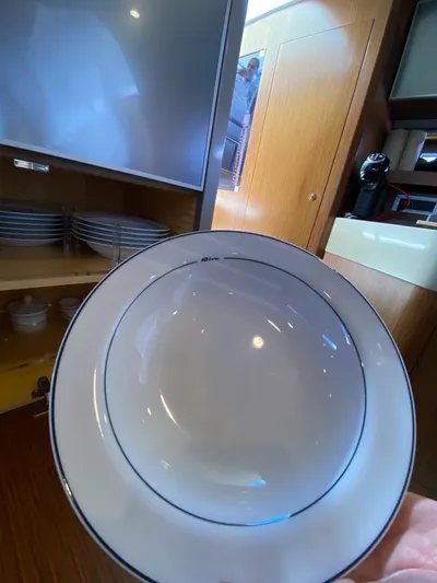  Yacht Photos Pics White bowl with blue rim in a Riva RAMA 44' yacht kitchen, 2006 model.