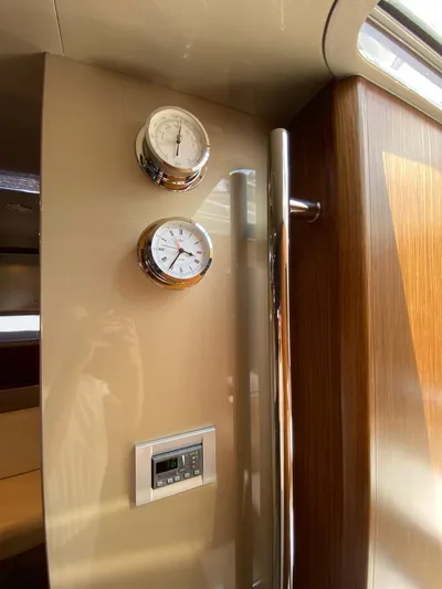  Yacht Photos Pics Interior of 2006 Riva RAMA 44' yacht with clock and barometer.