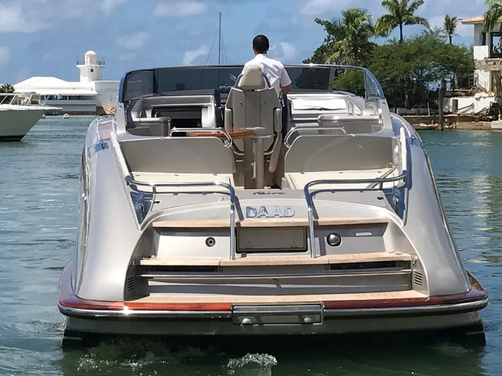  Yacht Photos Pics Luxury 2006 Riva RAMA 44' yacht cruising in sunny waters.