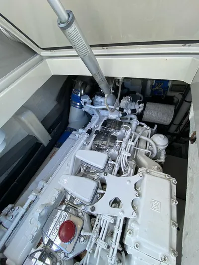  Yacht Photos Pics Engine compartment of a 2006 Riva RAMA 44' yacht, showcasing detailed mechanical components.