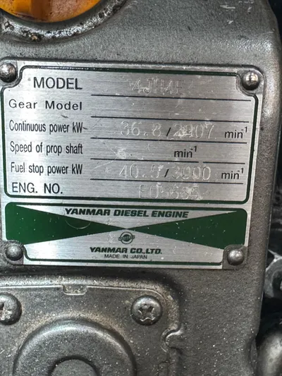 Mast Transit Yacht Photos Pics Yanmar diesel engine plate on 1983 Hinckley Sou'wester 42, model 4JH4E, showing specifications.