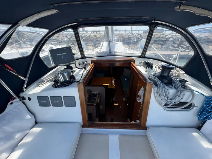 Mast Transit Yacht Photos Pics Cockpit of 1983 Hinckley Sou'wester 42 sailboat with navigation equipment and seating.