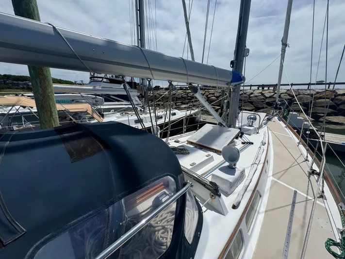 Mast Transit Yacht Photos Pics 1983 Hinckley Sou'wester 42 sailboat docked, showcasing deck and rigging details.