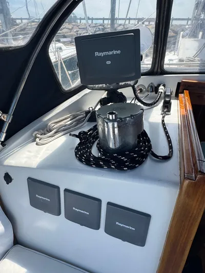 Mast Transit Yacht Photos Pics Hinckley Sou'wester 42 yacht cockpit with Raymarine equipment, ropes, and winch, 1983 model.