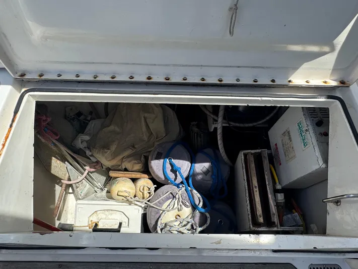 Mast Transit Yacht Photos Pics Storage compartment of 1983 Hinckley Sou'wester 42 sailboat, containing ropes and equipment.
