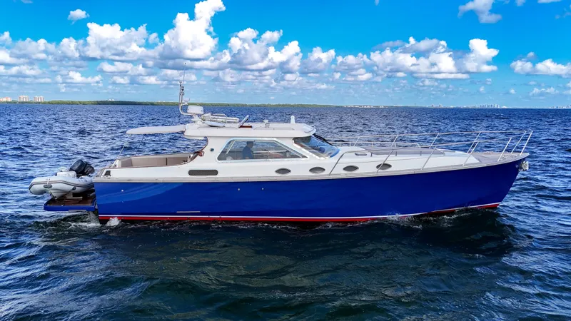  Yacht Photos Pics 2010 Revival 45 Gentlemans yacht on open water under blue sky.