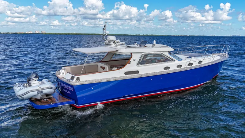  Yacht Photos Pics Revival 45 Gentlemans yacht, 2010 model, cruising on open water under a clear blue sky.